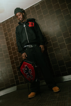DELORE RED SHIELD BACKPACK