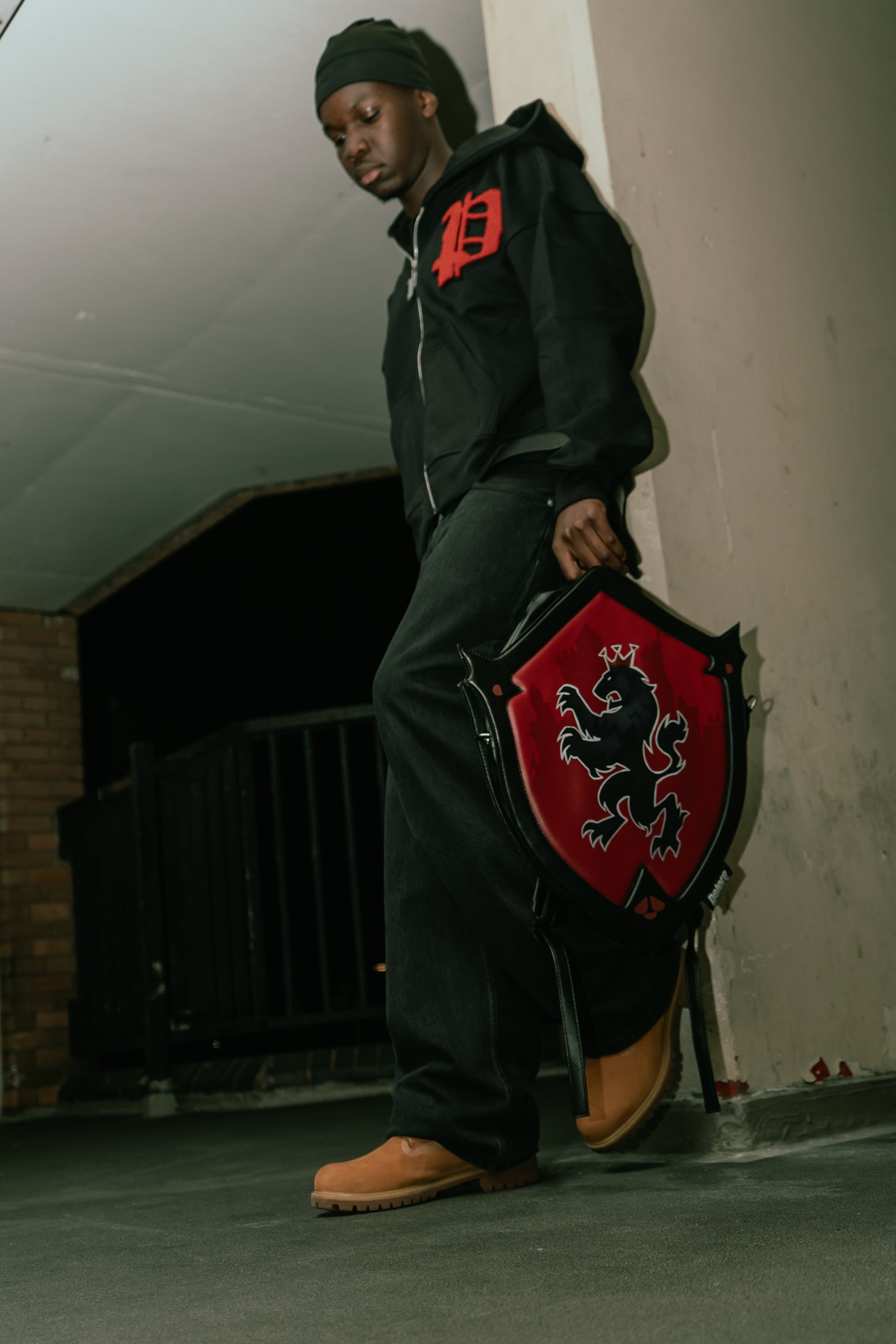 DELORE RED SHIELD BACKPACK